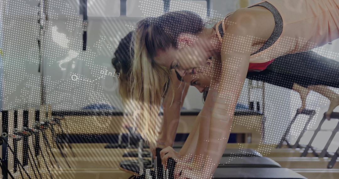 Fitness Enthusiast Practicing Pilates on Reformer with Digital Control Concept