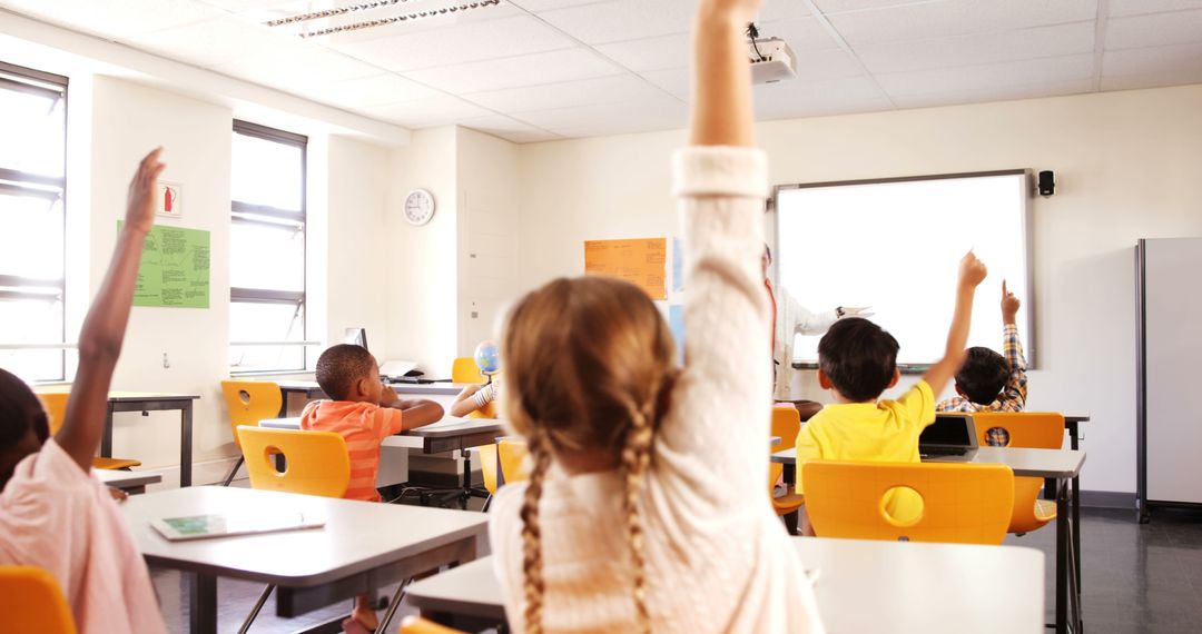 Children Raising Hands in Classroom to Participate - Free Images, Stock Photos and Pictures on Pikwizard.com