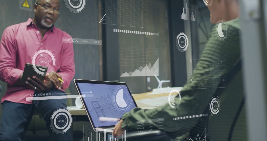 Innovative Team Analyzing Digital Financial Data in Modern Office