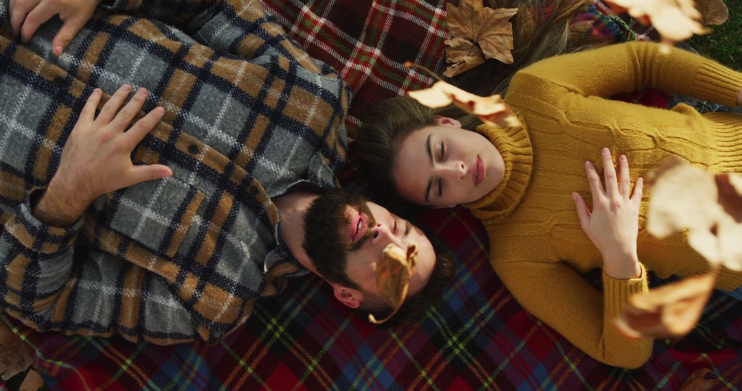 Couple Lying on Blanket Enjoying Autumn Leisure