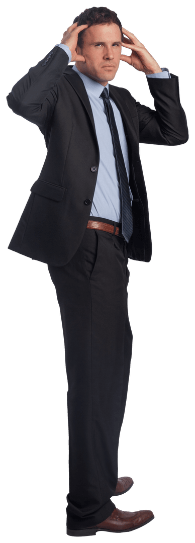 Stressed Businessman with Hands on Head in Suit