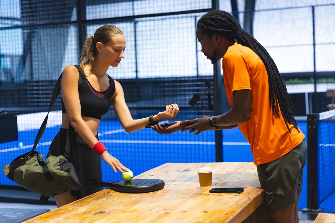 Coach and Athlete Using Wearable Device During Padel Training