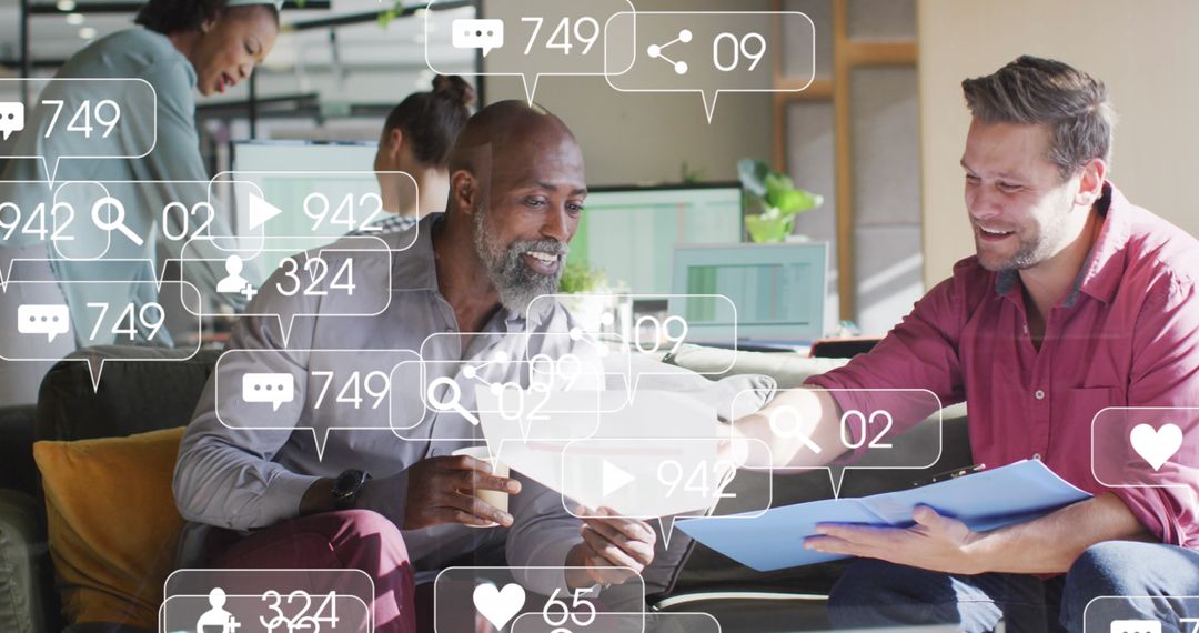 Diverse Coworkers Collaborating in Modern Office with Social Media Notifications