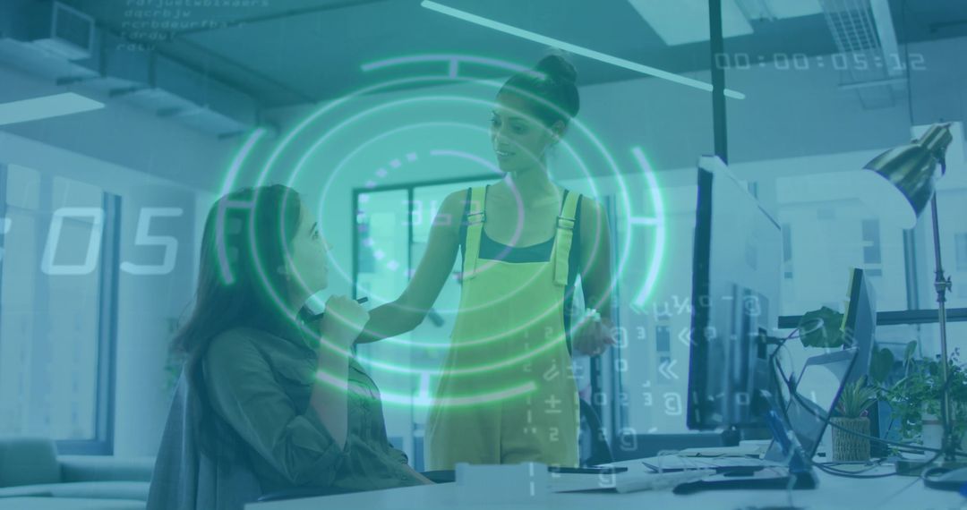 Women Using Holographic Data in Modern Office Collaboration