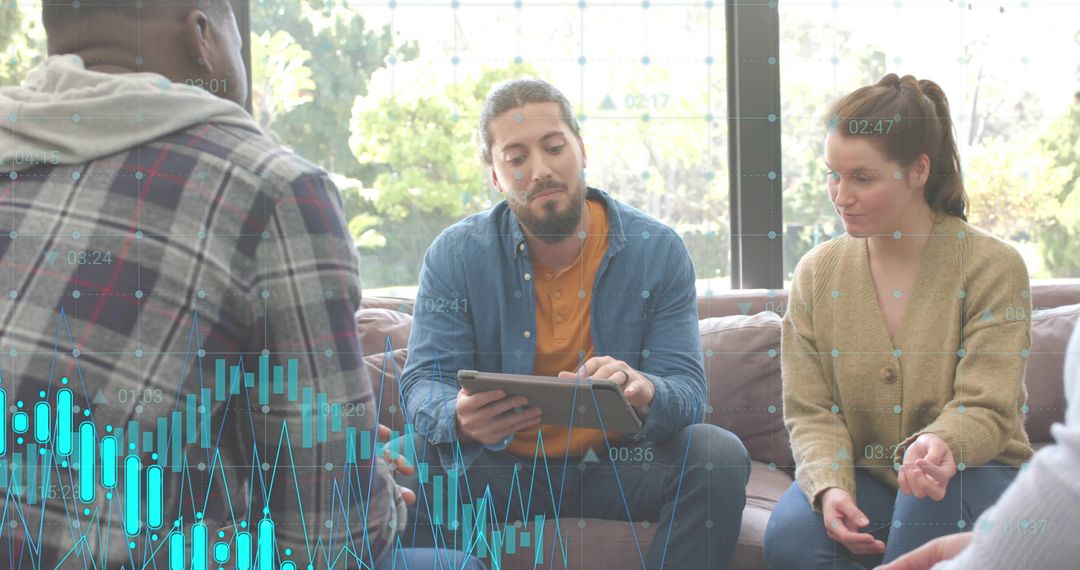 Team collaborating over tablet while reviewing interactive data charts for analytics planning