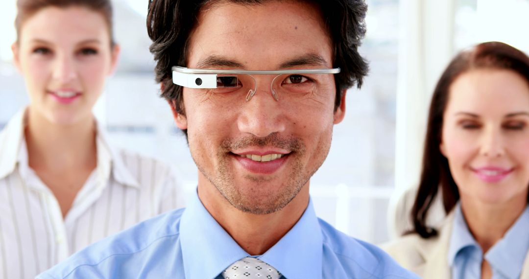 Smiling Businessman Demonstrating Smart Glasses Technology - Free Images, Stock Photos and Pictures on Pikwizard.com