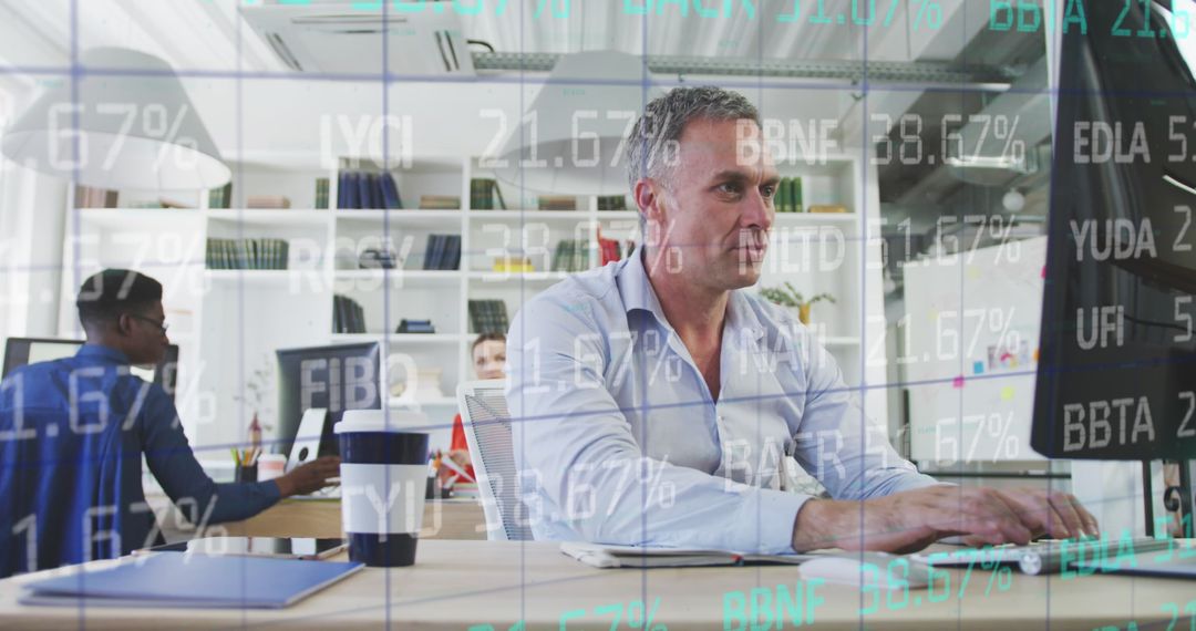 Business Professionals Analyzing Financial Data on Computers