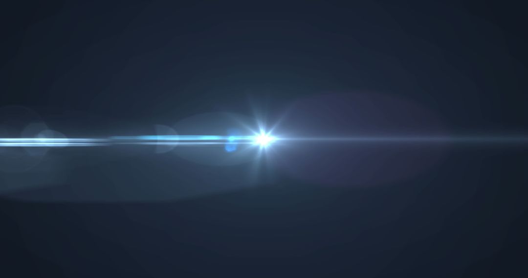 Lens Flare and Light Beam on Dark Background