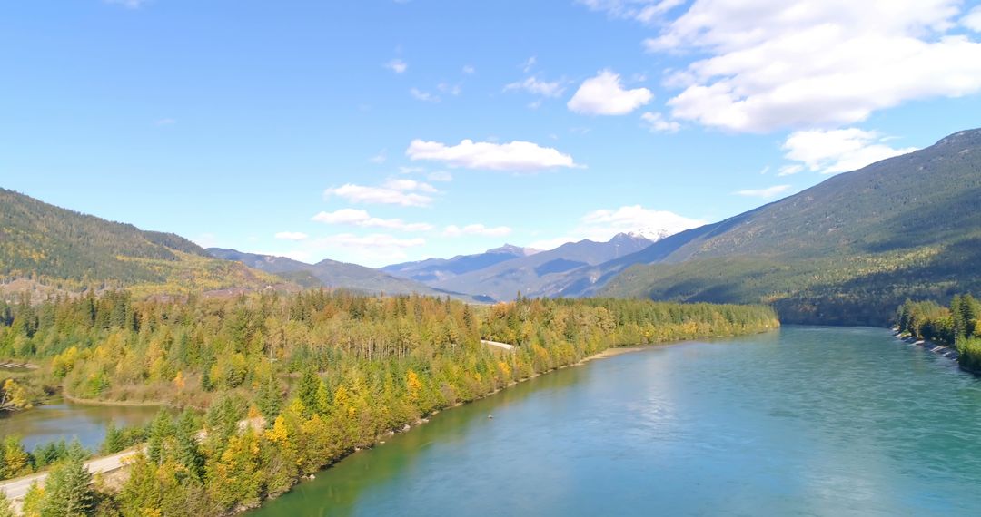 Serene Mountain Landscape and River on Clear Day - Free Images, Stock Photos and Pictures on Pikwizard.com