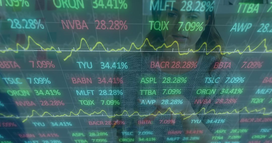 Business Analysts Monitoring Live Stock Market Data on Screen