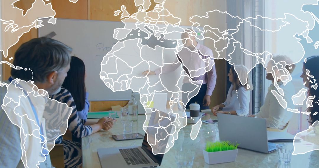 Global Business Team Analyzing Financial Data Trends in Modern Office