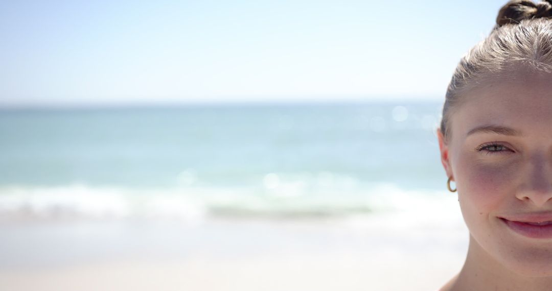 Serene Young Woman Enjoying Tranquil Beach Moments