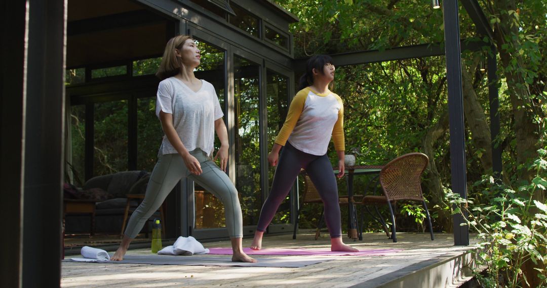 Women Practicing Yoga On Deck In Forest - Free Images, Stock Photos and Pictures on Pikwizard.com