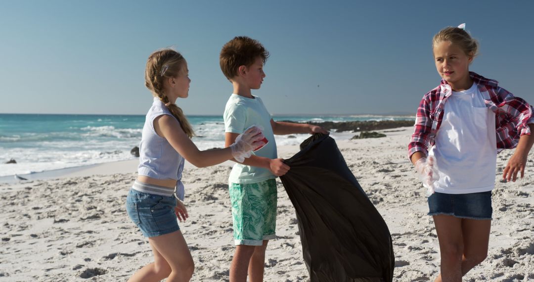 Children Cleaning Beach, Promoting Environmental Awareness - Free Images, Stock Photos and Pictures on Pikwizard.com