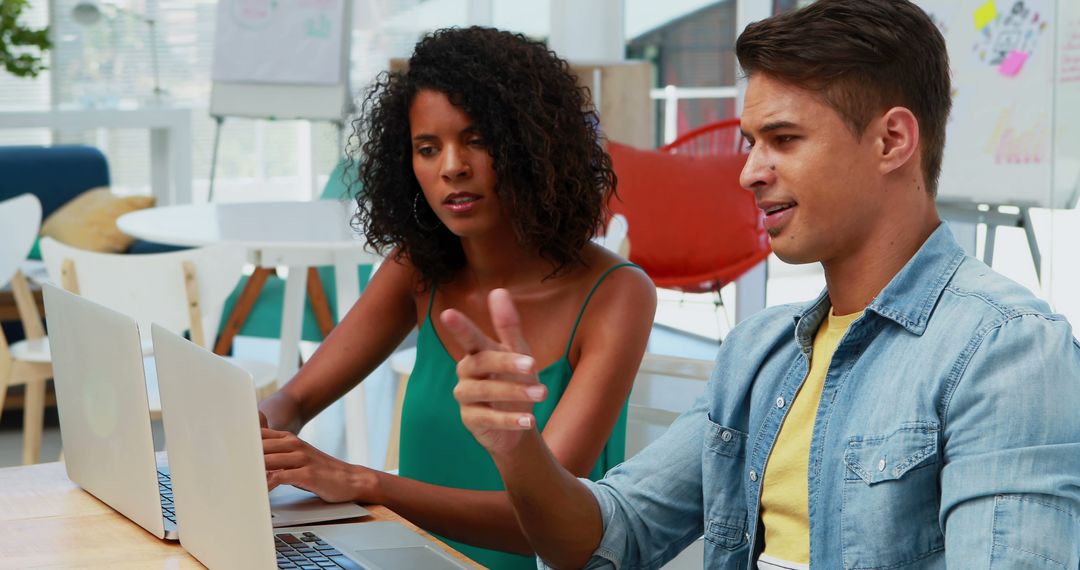 Young Multiracial Professionals Collaborating in Modern Office