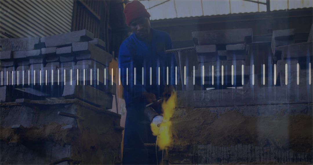 Foundry Worker Pouring Molten Metal in Industrial Workshop