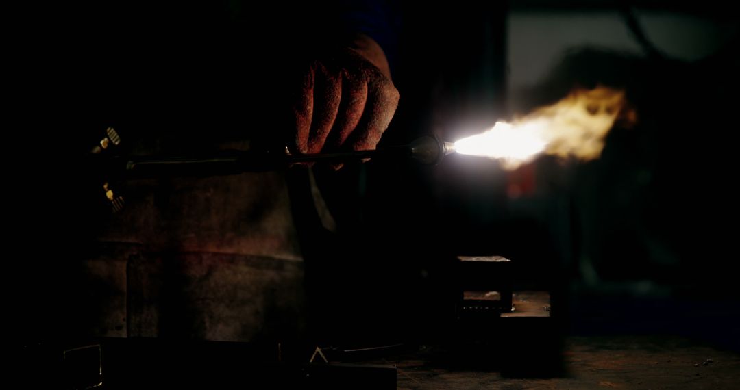 Welder holding welding torch in workshop 4k - Free Images, Stock Photos and Pictures on Pikwizard.com
