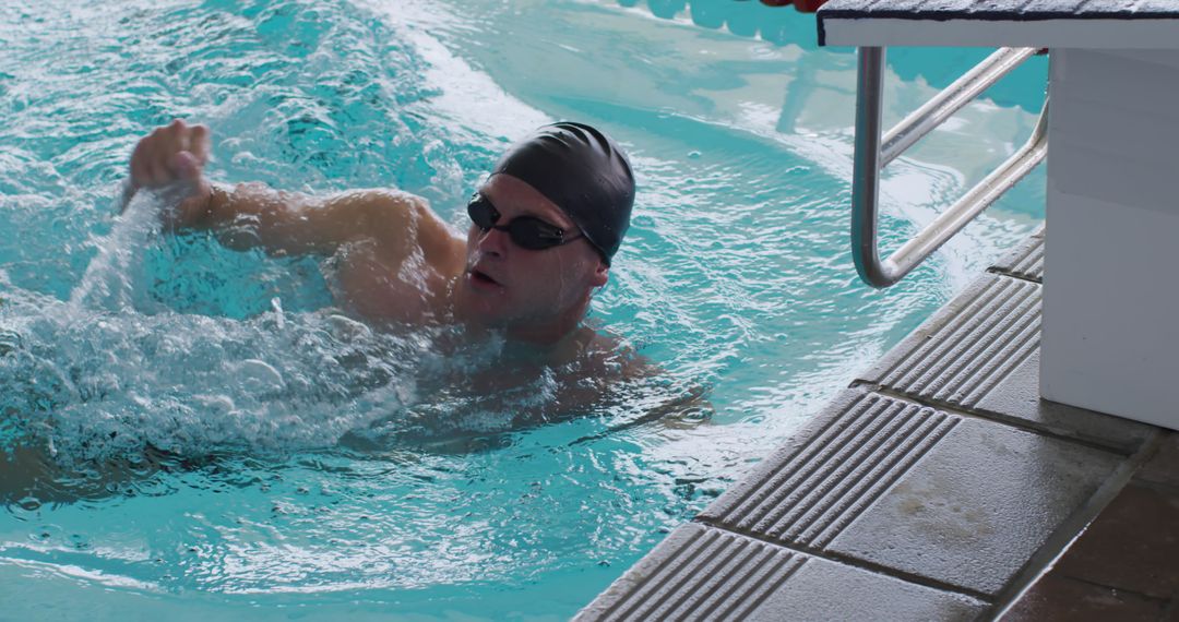 Male Swimmer Training in Indoor Pool - Free Images, Stock Photos and Pictures on Pikwizard.com