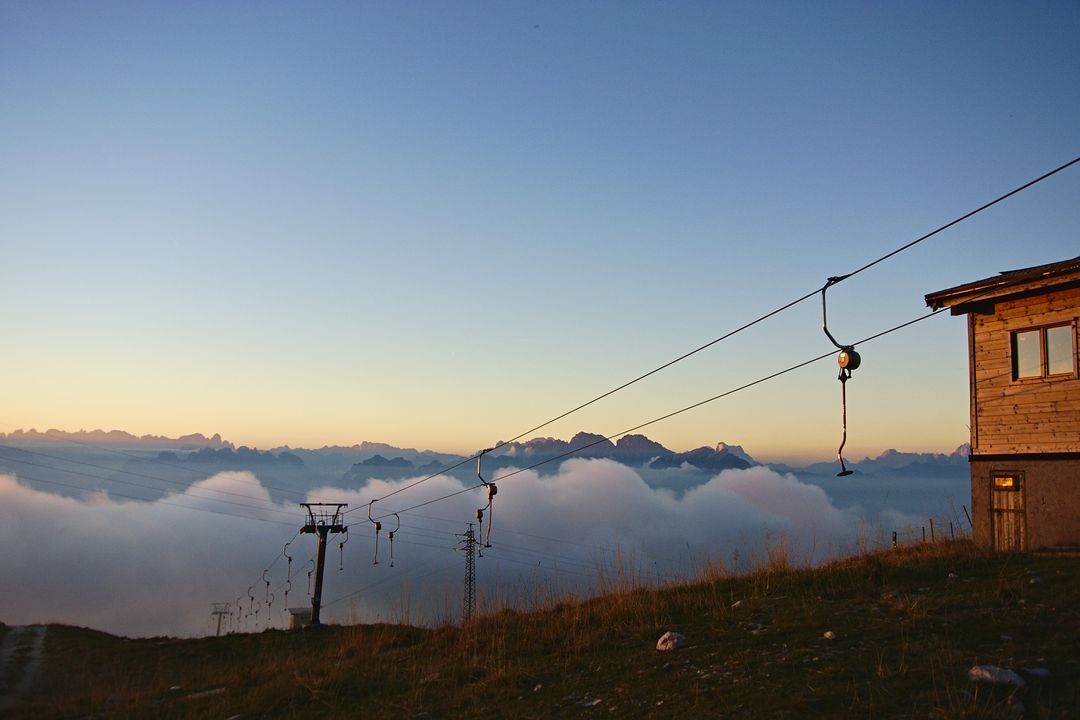 Mountain Cable Lift at Sunrise with Cloud Sea Below - Free Images, Stock Photos and Pictures on Pikwizard.com