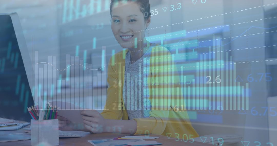 Smiling Asian Businesswoman Analyzing Financial Data with Digital Graph Overlays