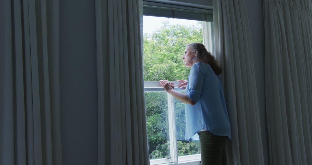 Woman Leaning Out Open Window, White Curtains Frame Outdoors - Free Images, Stock Photos and Pictures on Pikwizard.com