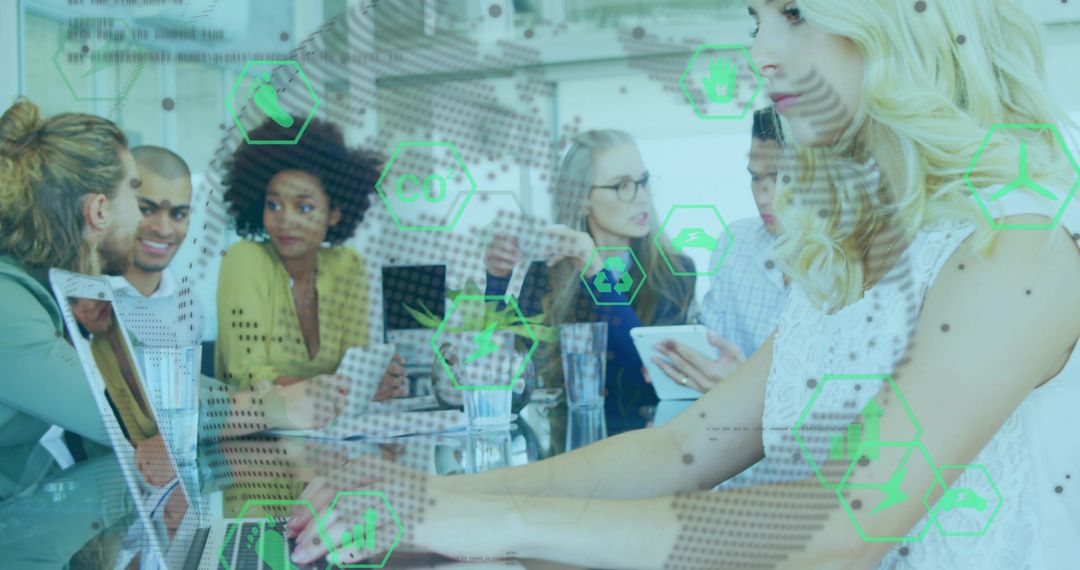 Typing blonde digital analyst leading collaborative data visualization meeting with team