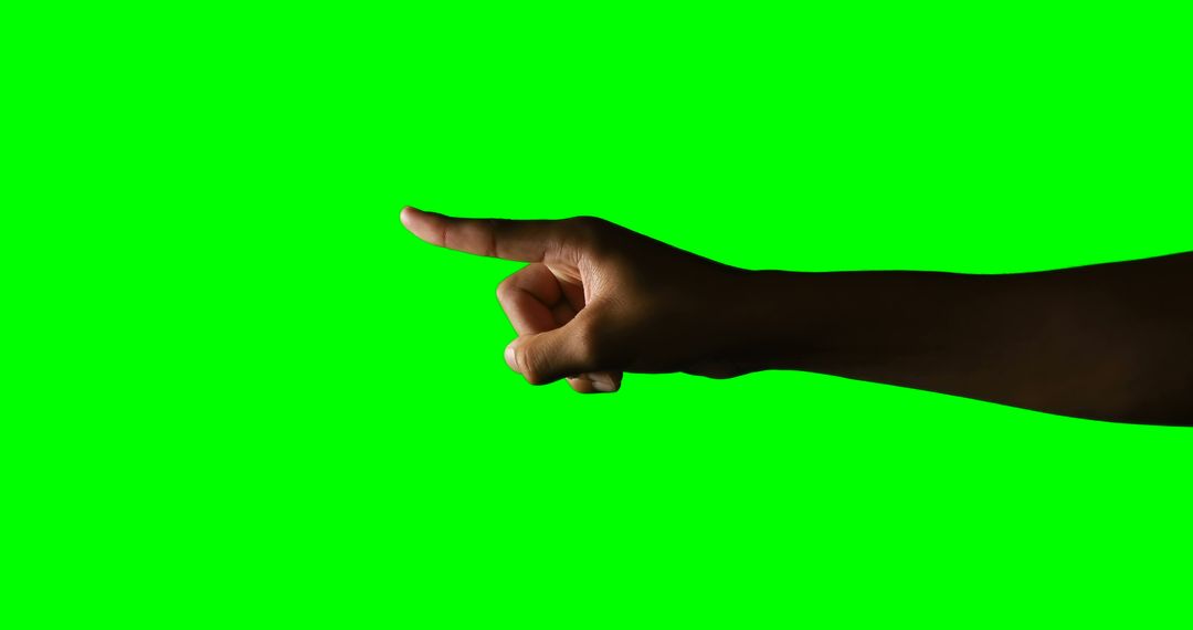 Hand Pointing to Right with Green Background - Free Images, Stock Photos and Pictures on Pikwizard.com