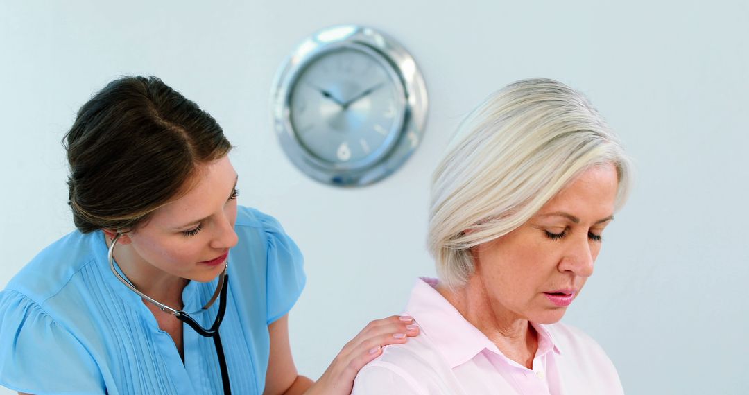 Compassionate Doctor Consulting Concerned Senior Patient in Clinic - Free Images, Stock Photos and Pictures on Pikwizard.com