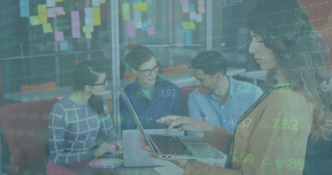 Tech-Savvy Business Professionals Analyzing Financial Data