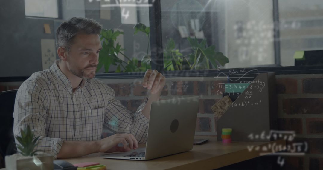 Caucasian Businessman Analyzing Data with Mathematical Equations in Office