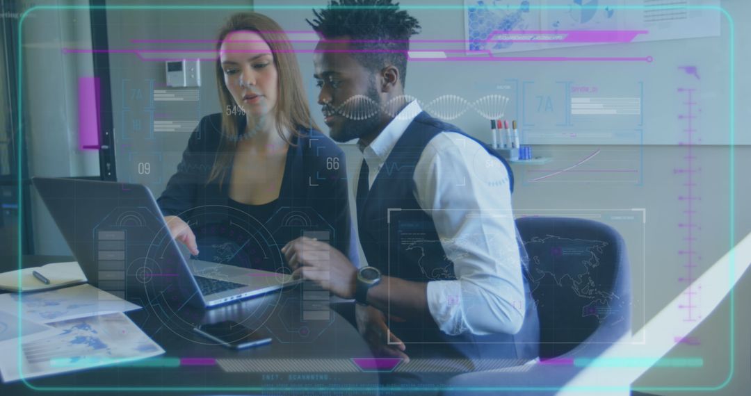 Diverse Colleagues Analyzing Data on Laptop