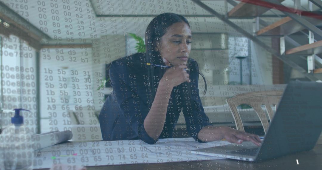 Software Engineer Analyzing Code on Laptop at Home Office