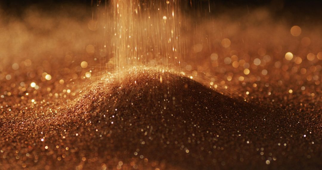 Shimmering Gold Glitter Gems on Dark Background