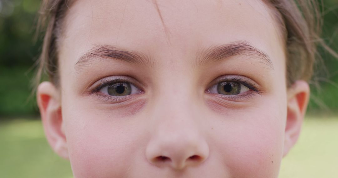 Close-Up Image of Young Child's Eyes and Face Outdoors - Free Images, Stock Photos and Pictures on Pikwizard.com