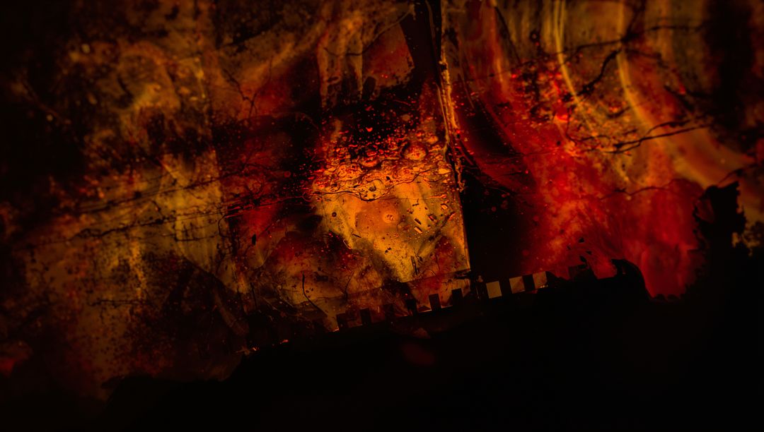 Abstract Artistic Representation of Fiery Textures Through Glass