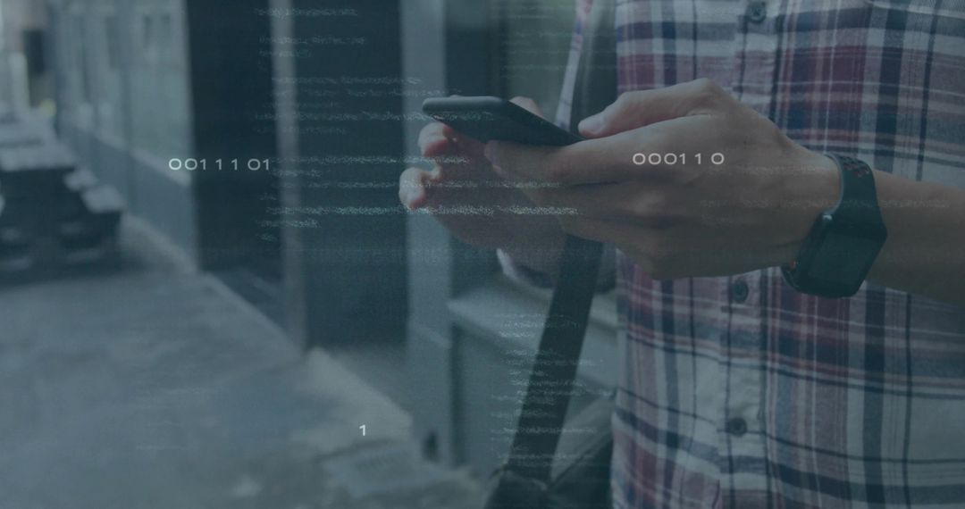 Man Holding Smartphone Viewing Binary Code Overlay in Urban Setting