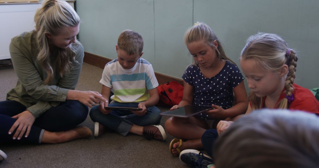 Children Using Tablets in Classroom with Teacher - Free Images, Stock Photos and Pictures on Pikwizard.com