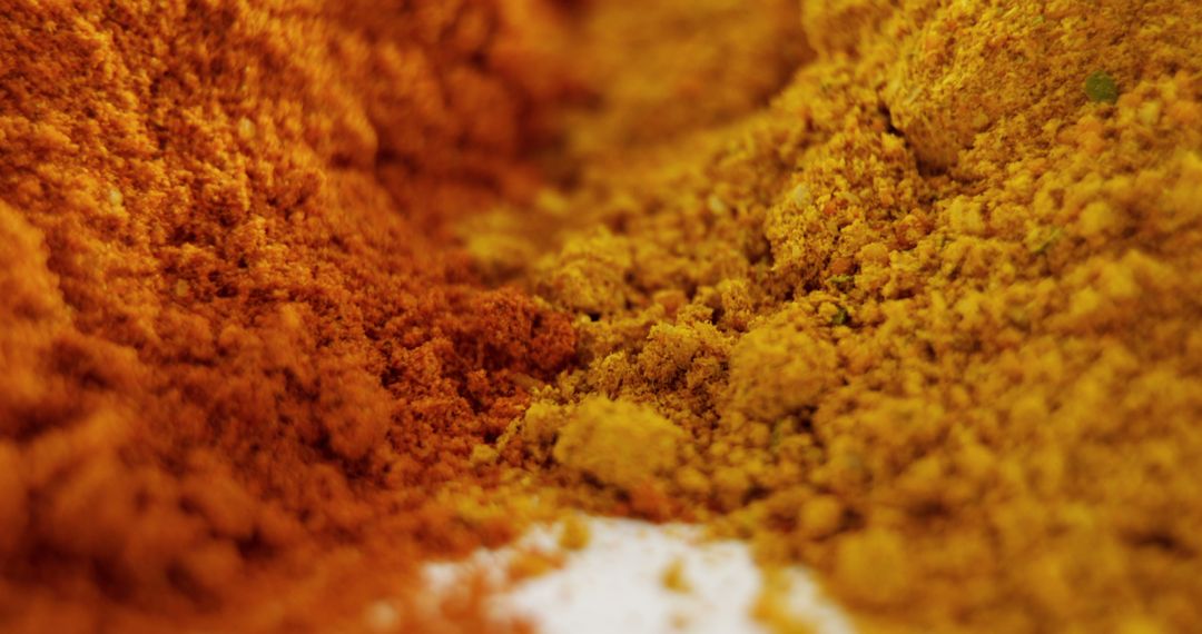 Close-up of Vibrant Ground Spices with Red and Yellow Hues - Free Images, Stock Photos and Pictures on Pikwizard.com