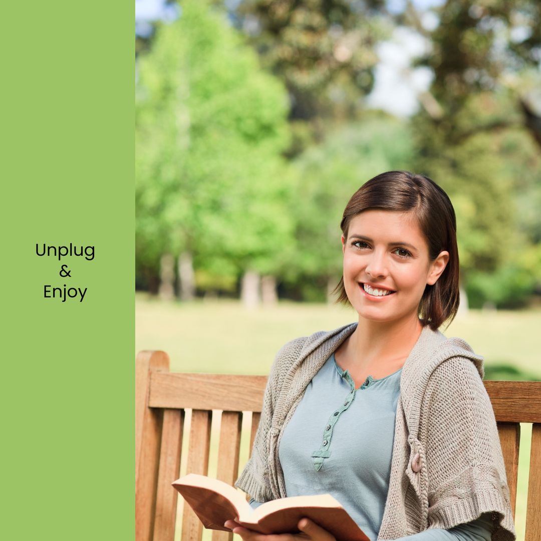 Woman Enjoying Outdoor Reading Time on Park Bench