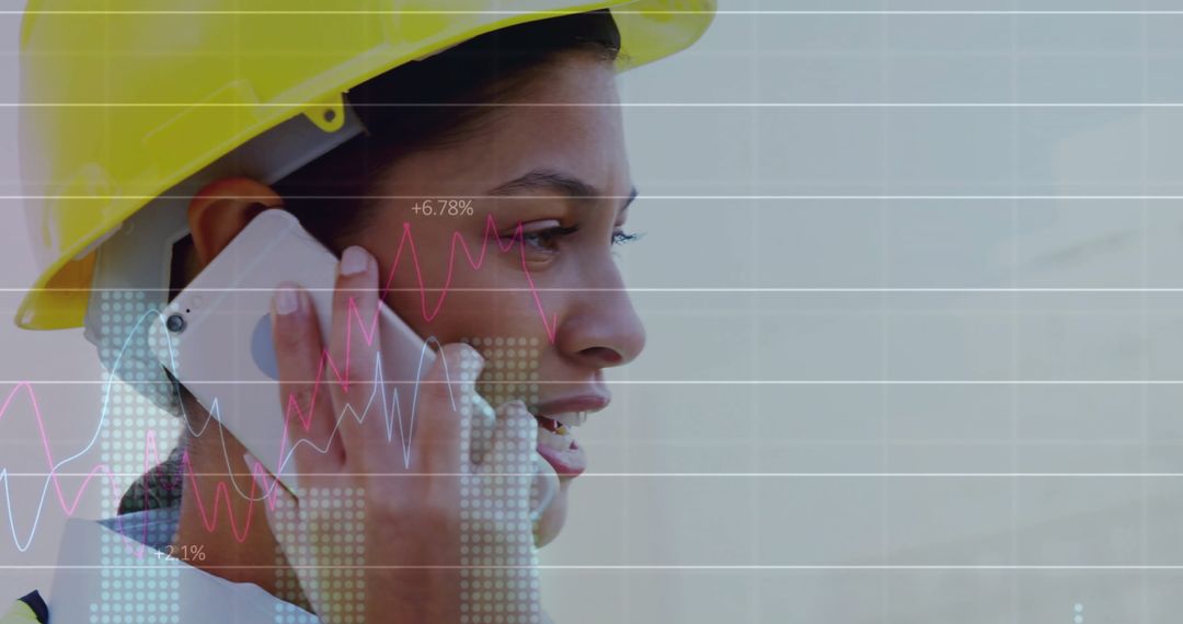Female Engineer Communicating While Overlaid with Data Visuals