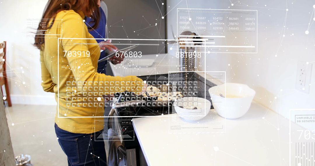 Modern Couple Cooking Meal with Digital Overlay in Home Kitchen
