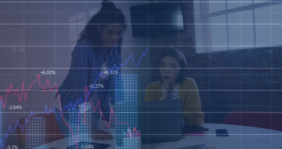 Diverse Women Collaborating with Data Visualization Overlay in Office