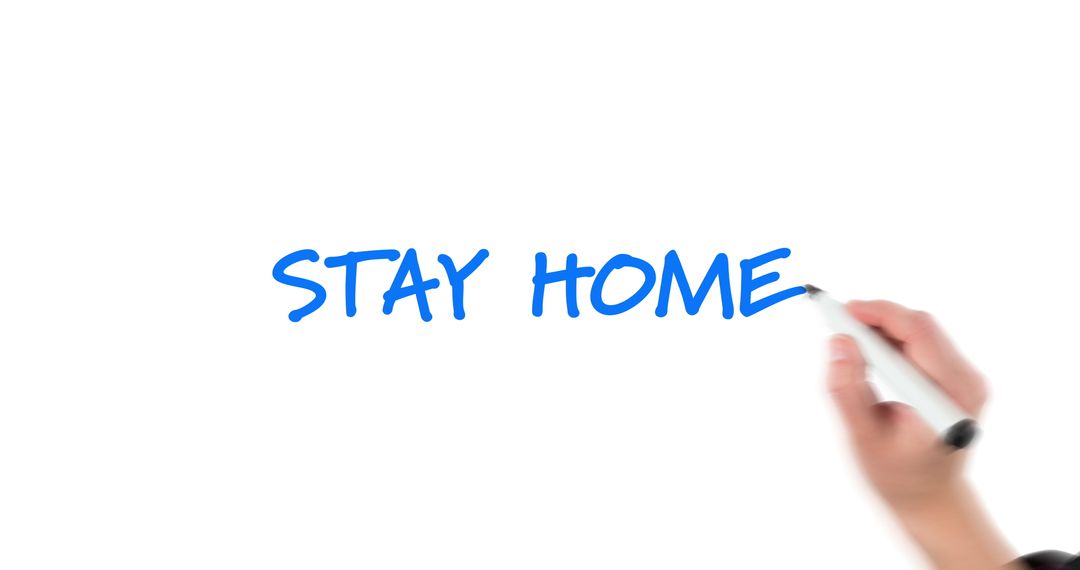 Close-Up of Hand Writing Stay Home Health Precaution Message