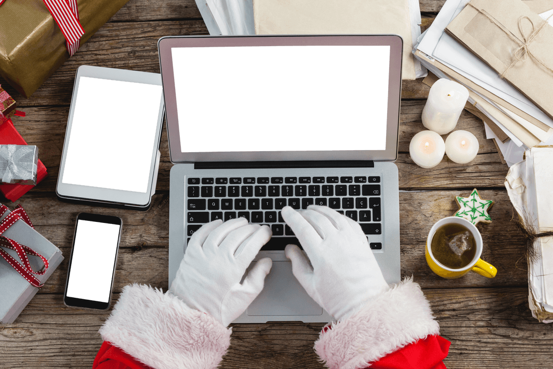 Transparent View of Santa Claus' Hands Typing on Laptop