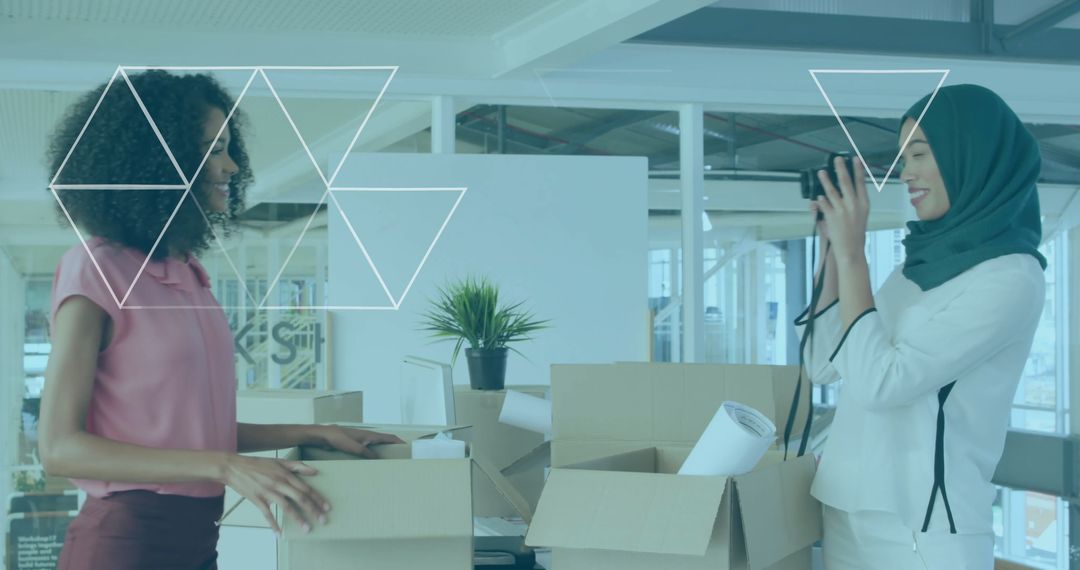 Office Professionals Unpacking Boxes and Photographing Items