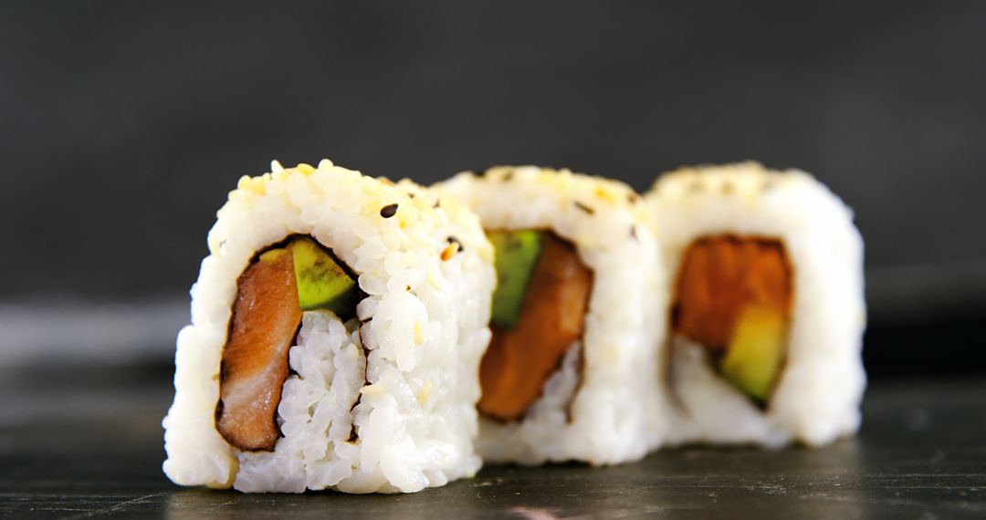 Close-Up of Fresh California Sushi Rolls with Avocado and Salmon - Free Images, Stock Photos and Pictures on Pikwizard.com