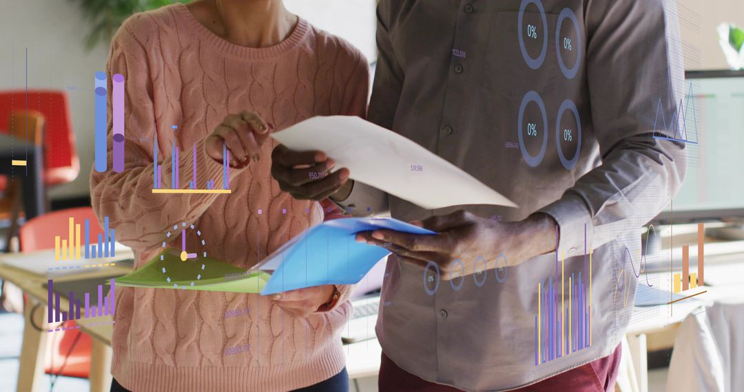 Professionals Collaborating on Analytics in Modern Office