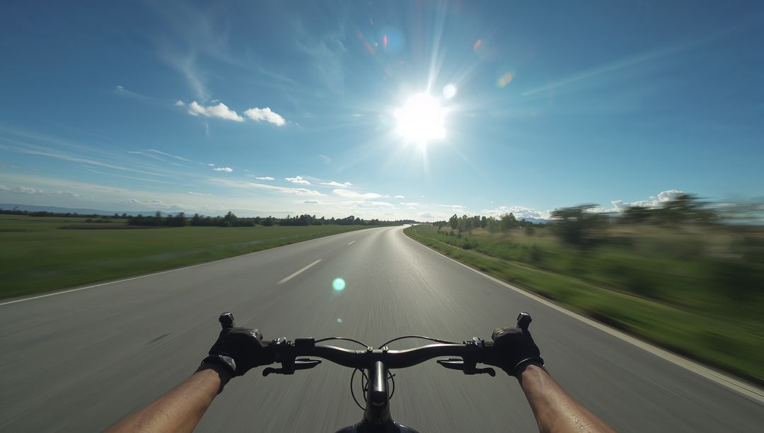 POV Cycling on Open Road with Sunrise Through Rural Countryside