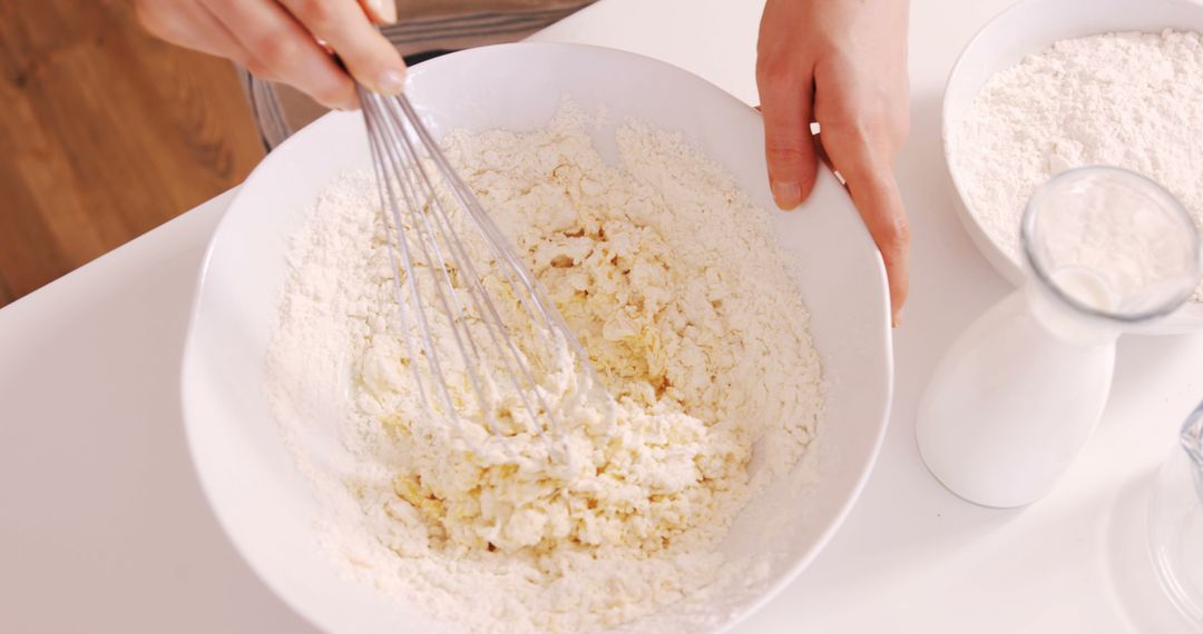 Person Mixing Dough in White Bowl with Whisk - Free Images, Stock Photos and Pictures on Pikwizard.com