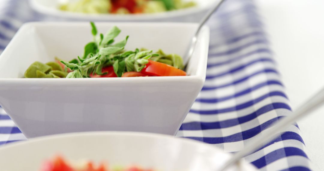 Fresh Salad in White Bowl on Checkered Tablecloth - Free Images, Stock Photos and Pictures on Pikwizard.com